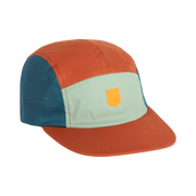 Color-blocked cap with orange, teal, and mint green panels and a yellow patch on the front.