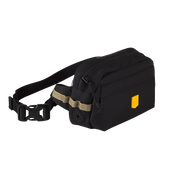 Black fanny pack with a yellow logo tag and an adjustable buckled strap.