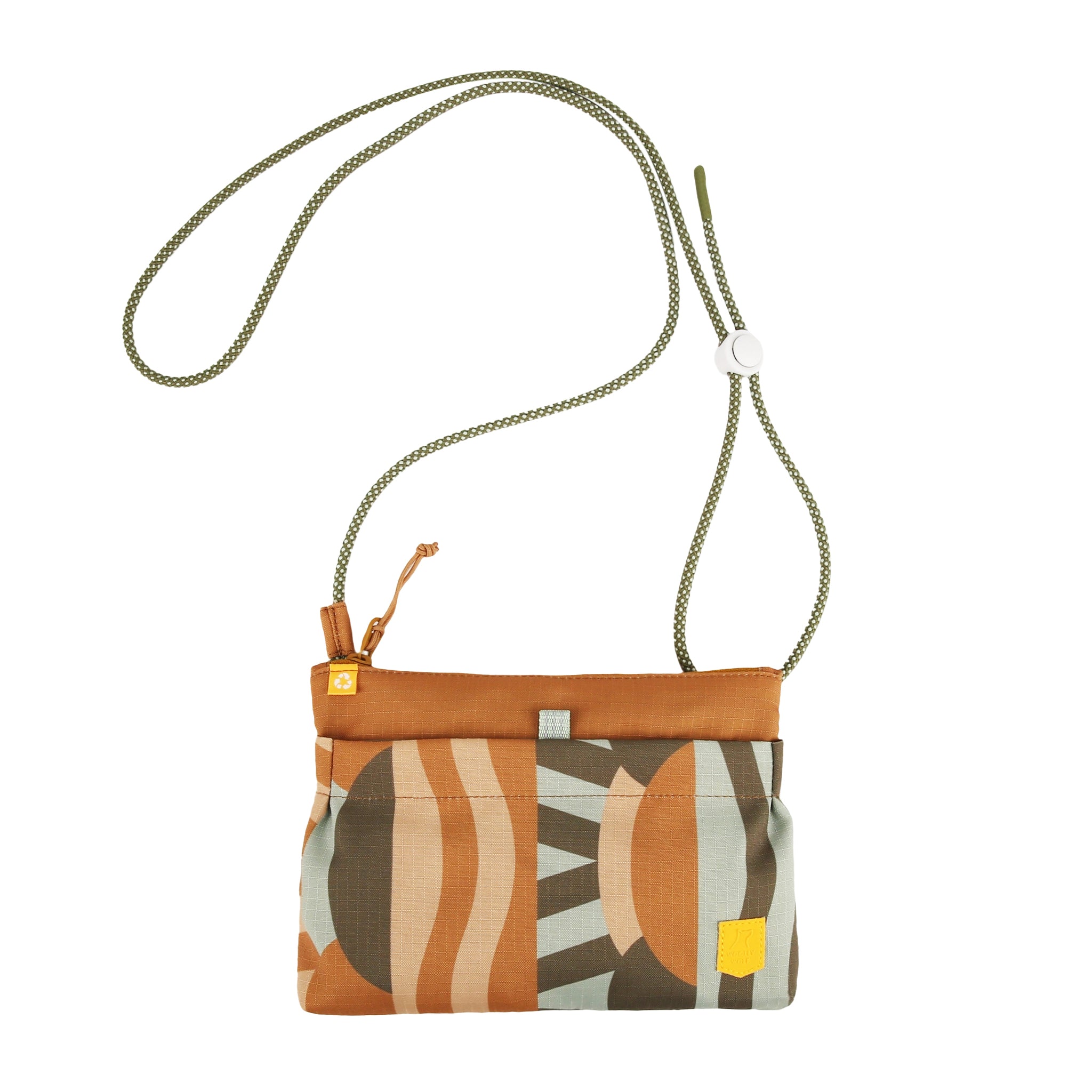 Small fabric crossbody bag with abstract earthy pattern and green rope strap, set against a white background.