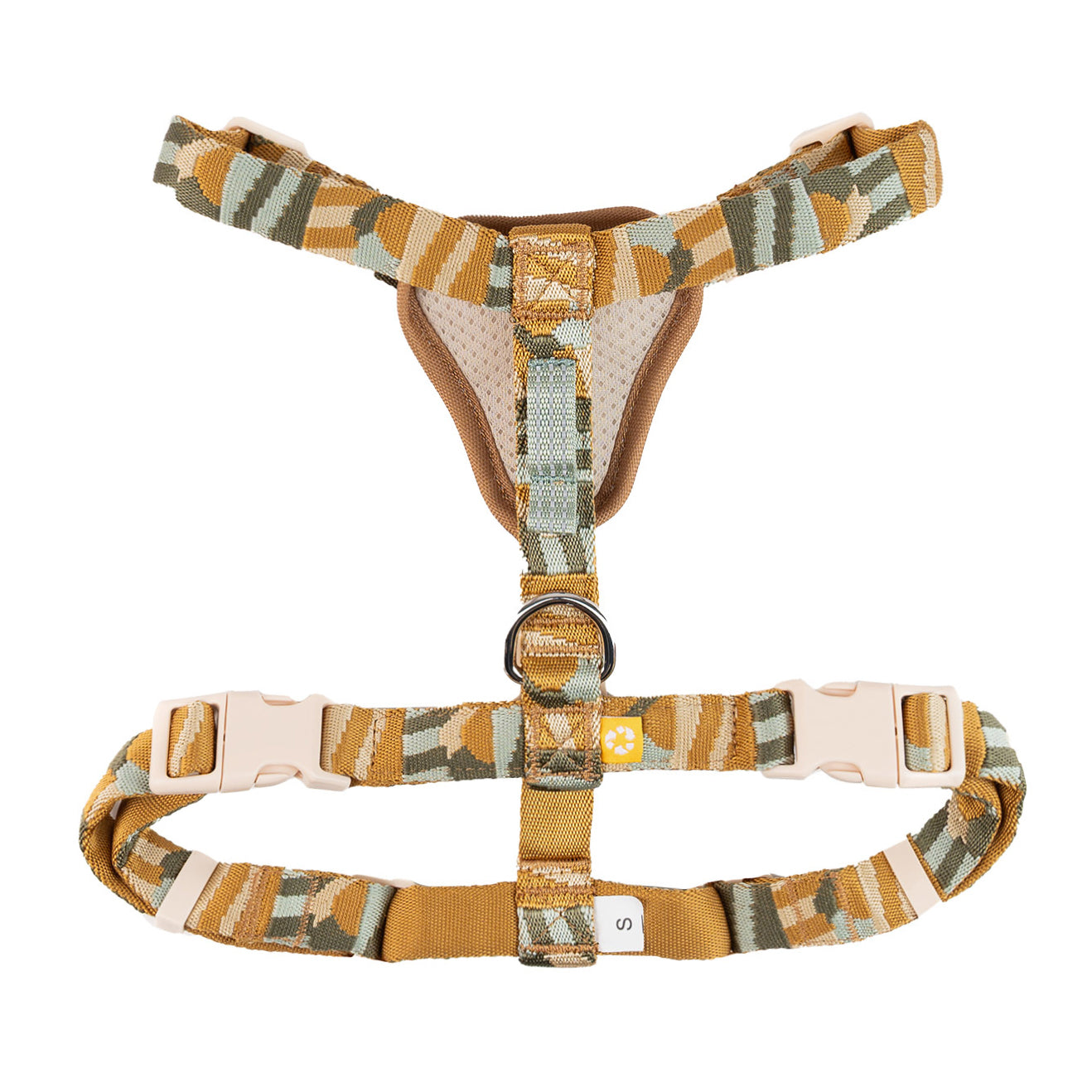 Camo-patterned dog harness with adjustable straps and plastic buckles, shown laid flat on a white background.